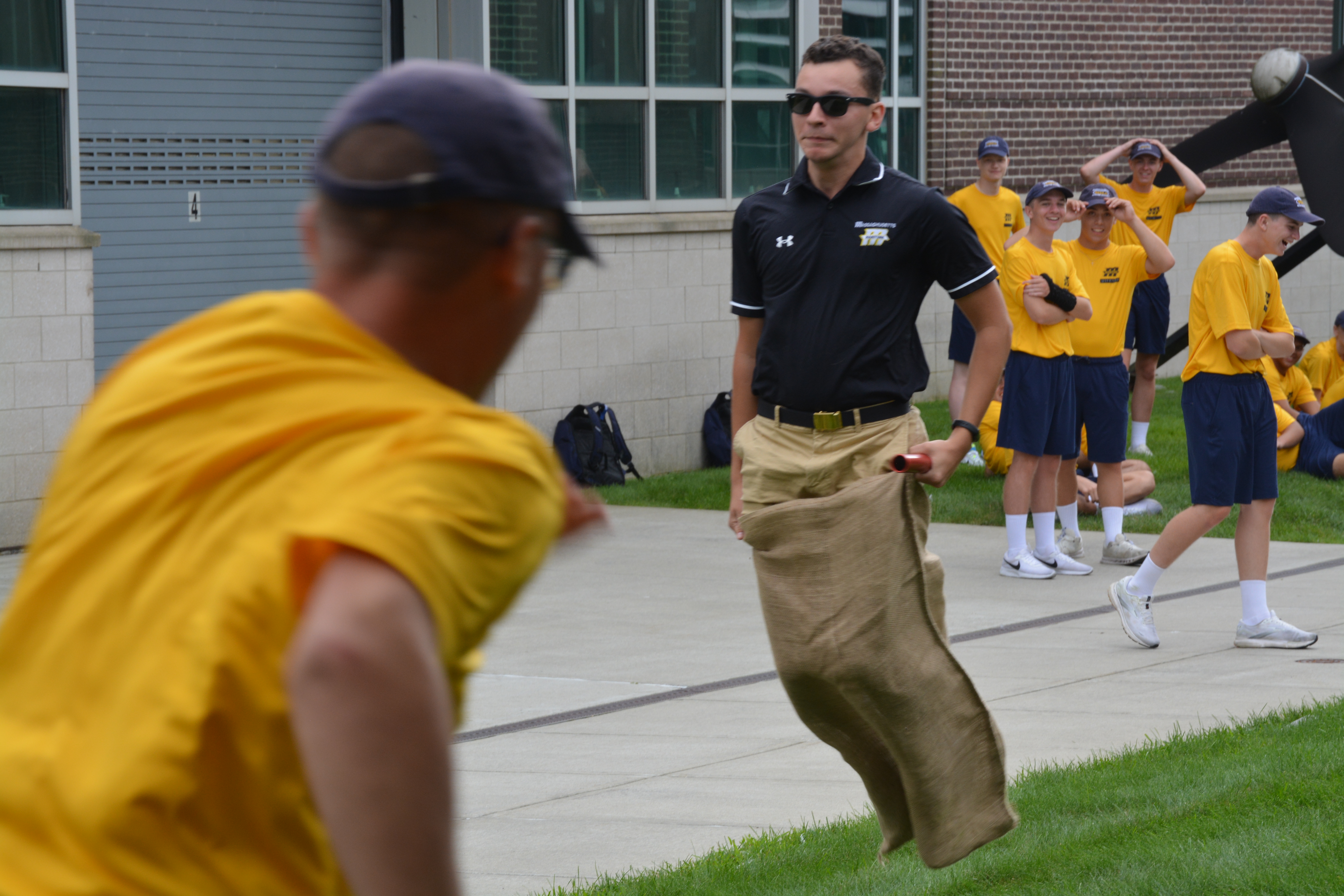 1/C Lydell participates in the relay race