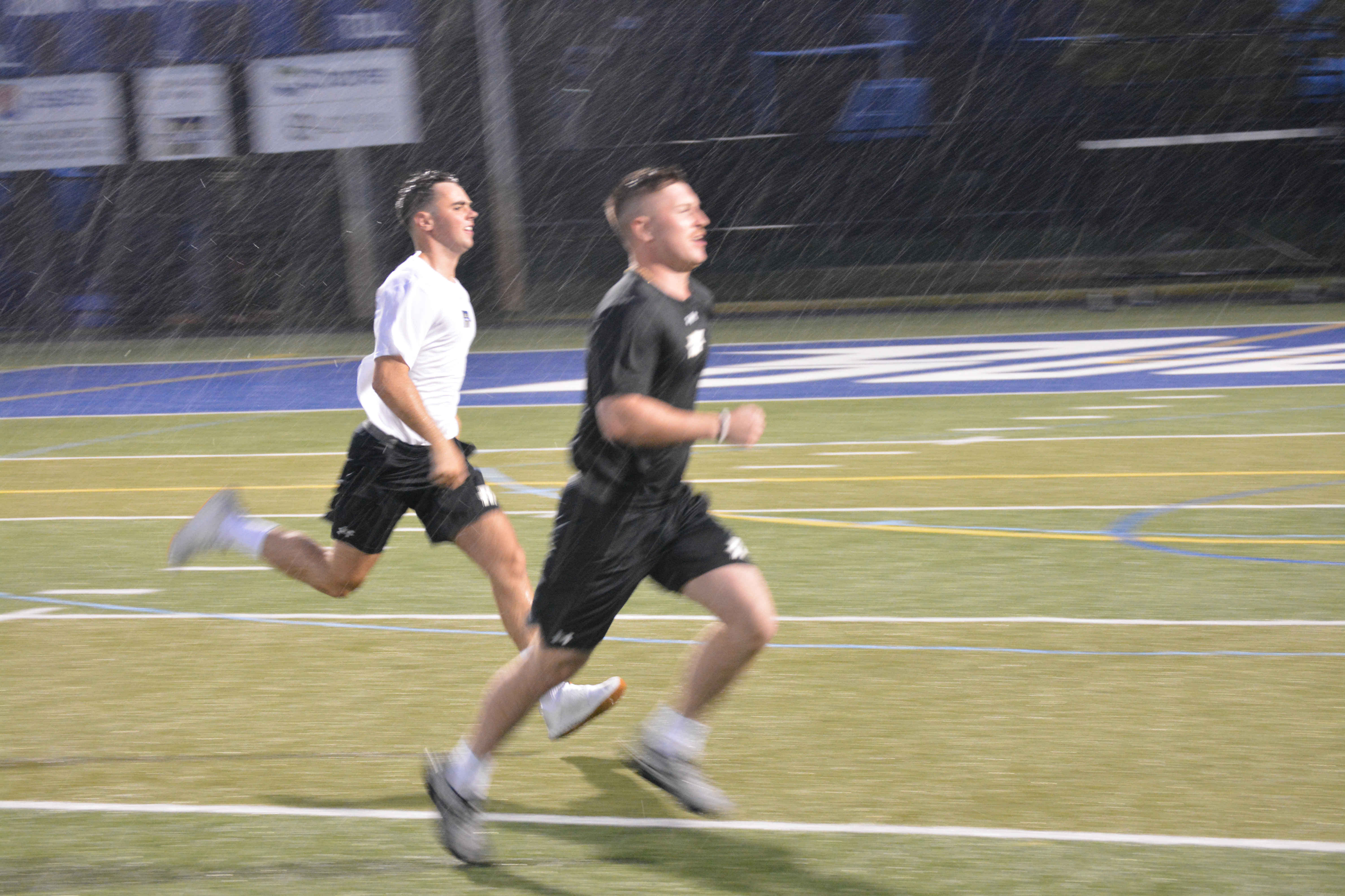 The Cadre giving their all during a rainy morning PT