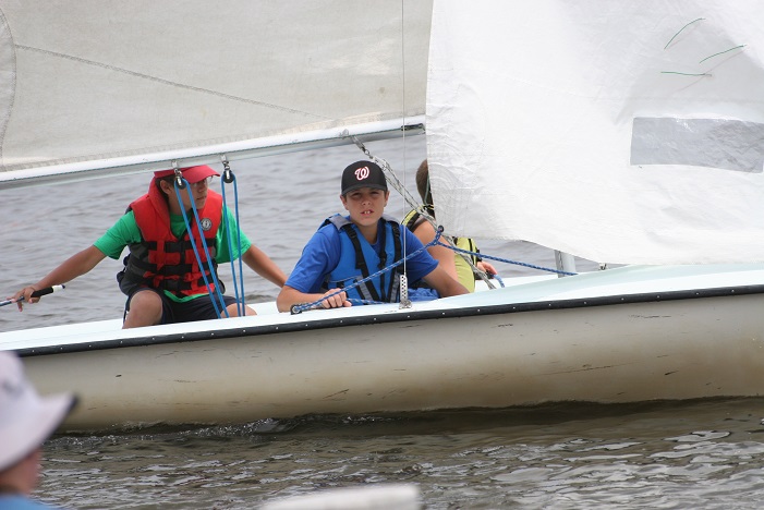 young Nick on a boat