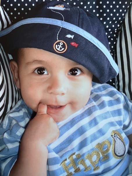 baby Ethan wearing a sailor hat