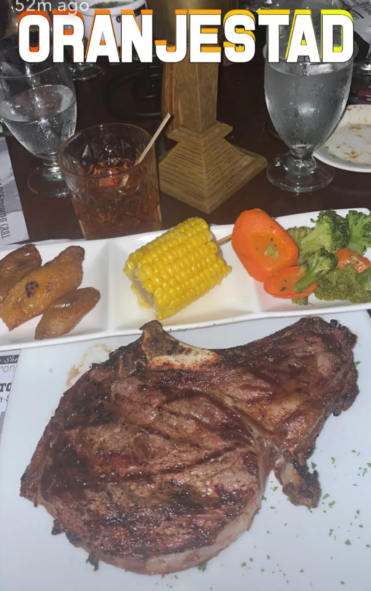 steak on a plate with corn