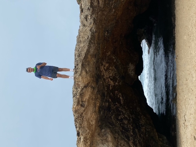 cadet standing on natural bridge