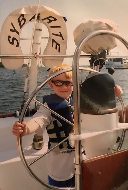 young Brendan in a boat