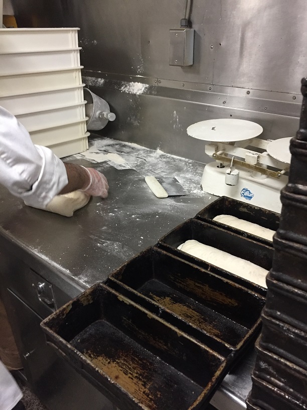 putting dough into pans