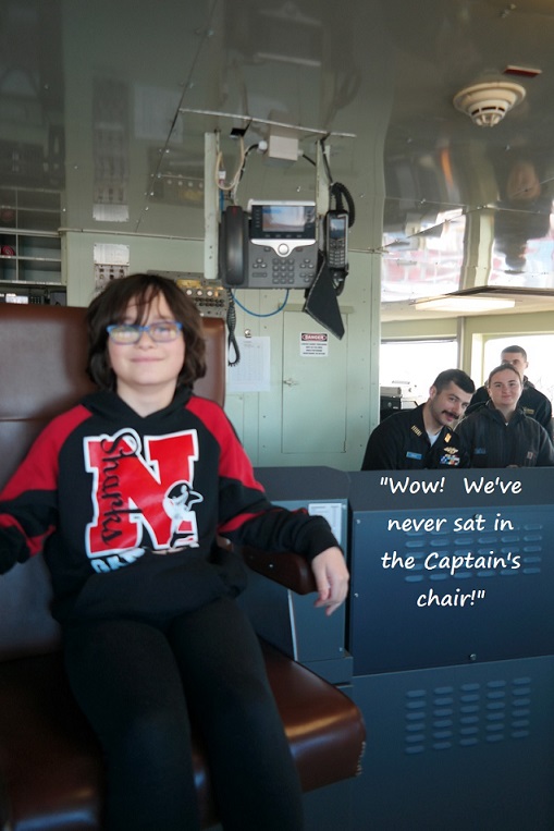 son in captain's chair