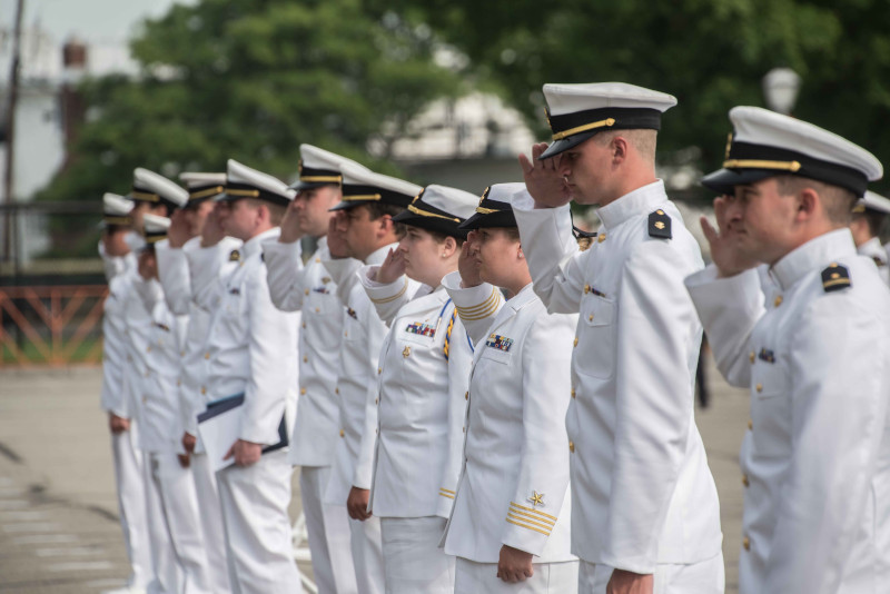 Cadets in whites standing at attention