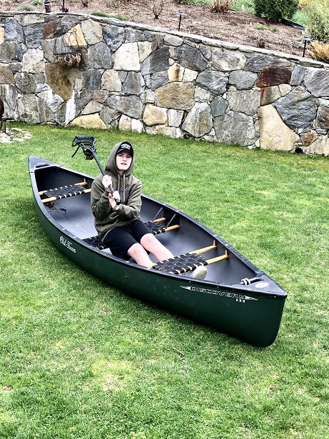 Chett in a canoe