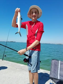 young Clayton fishing