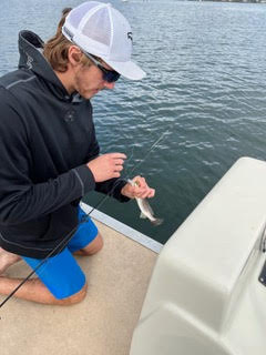 young Clayton fishing