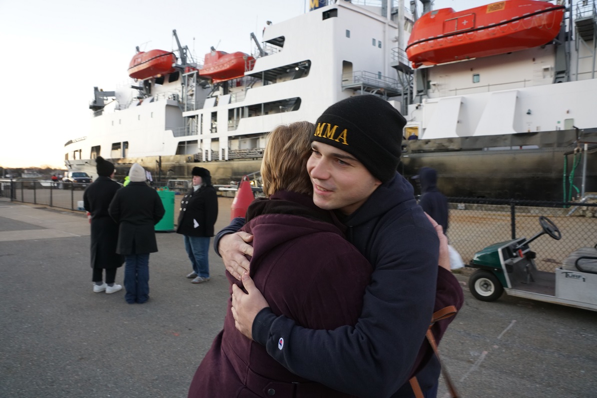 son hugs mom