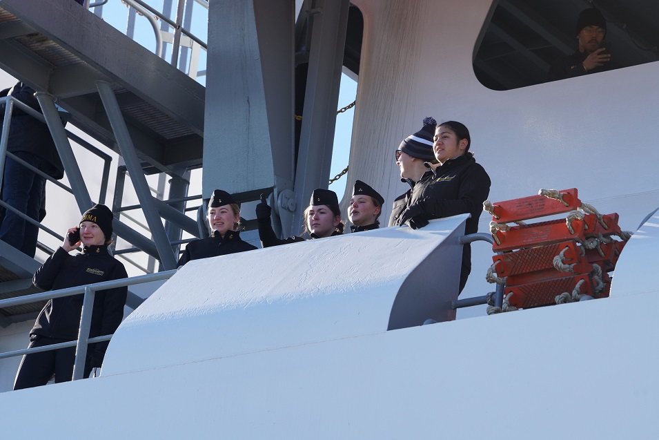 cadets wave goodbye from ship