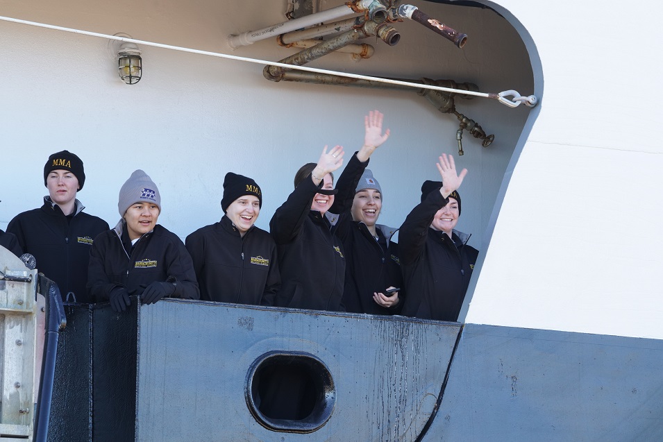 cadets wave goodbye from ship