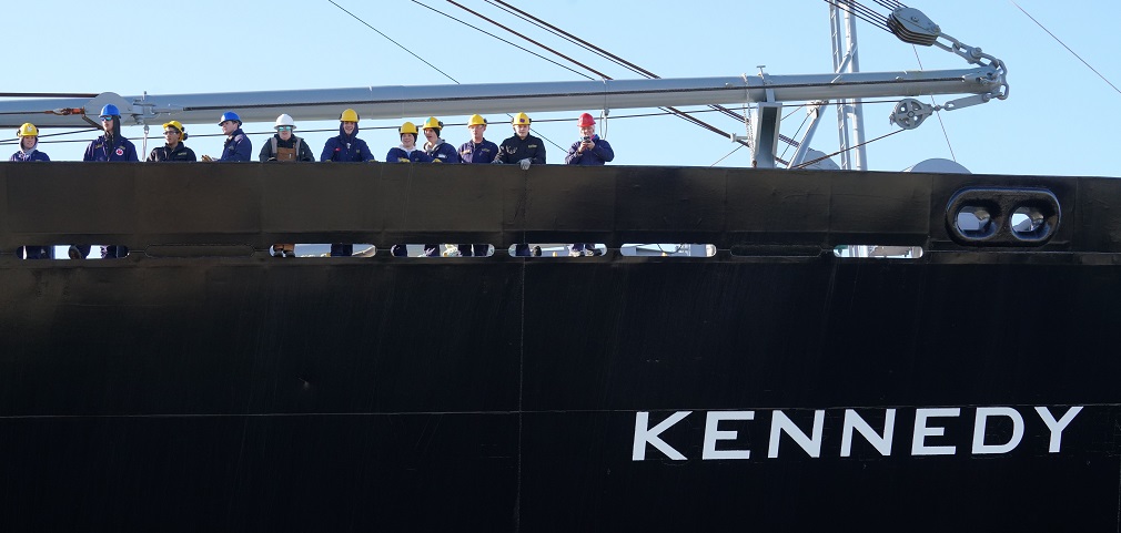 cadets wave goodbye from ship