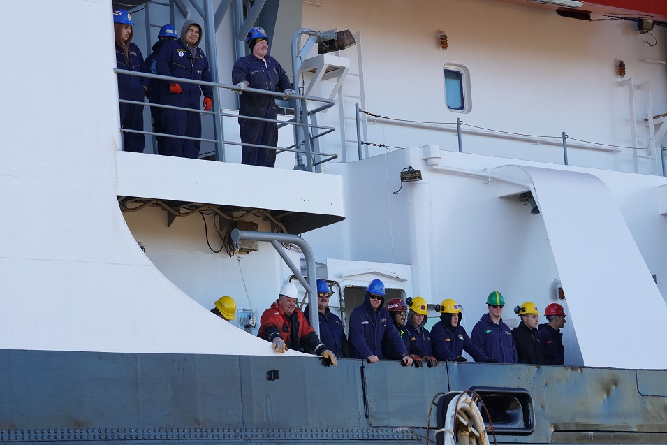 cadets wave goodbye from ship