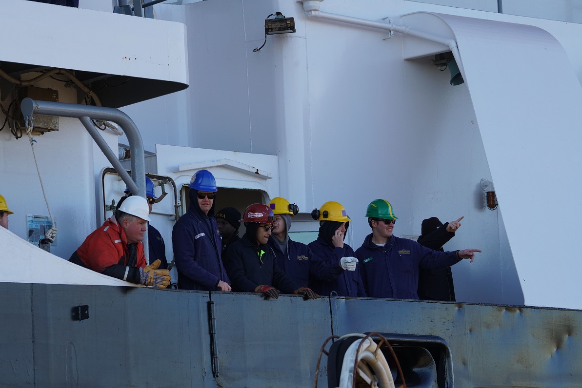 cadets wave goodbye from ship