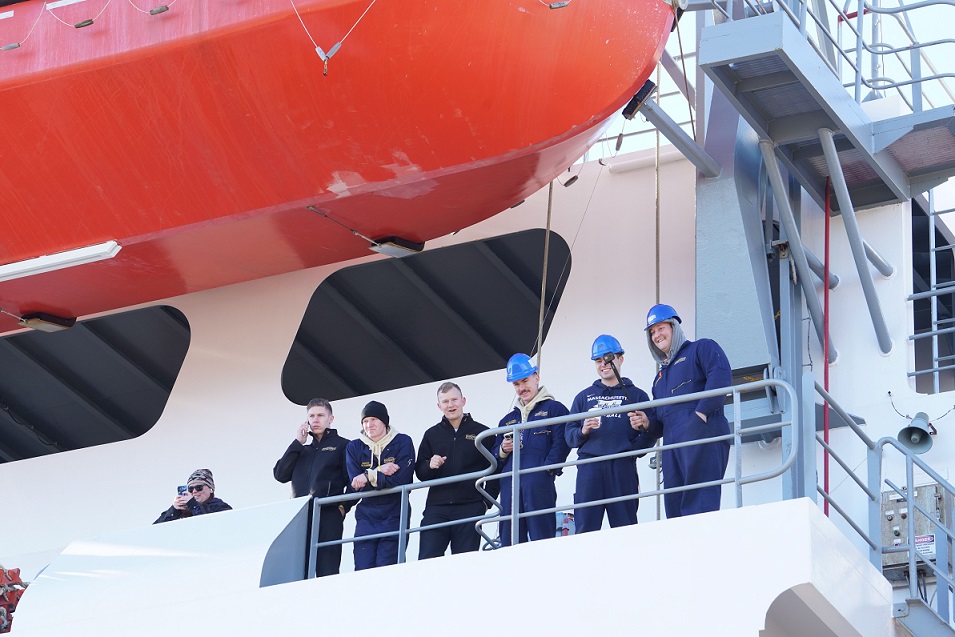 cadets wave goodbye from ship