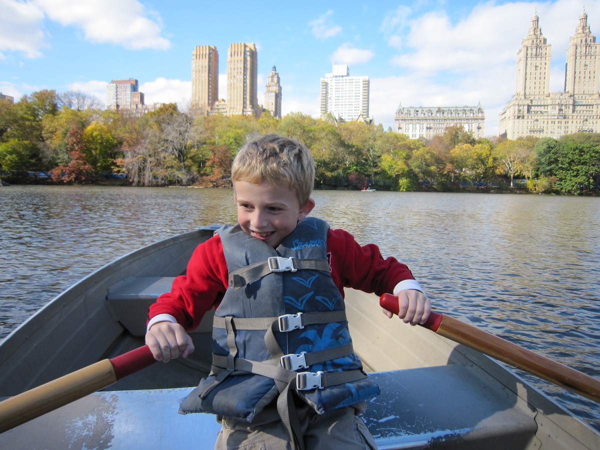 Daniel rowing a boat