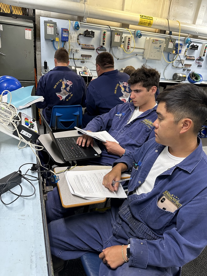 cadets in engine lab working with various tools