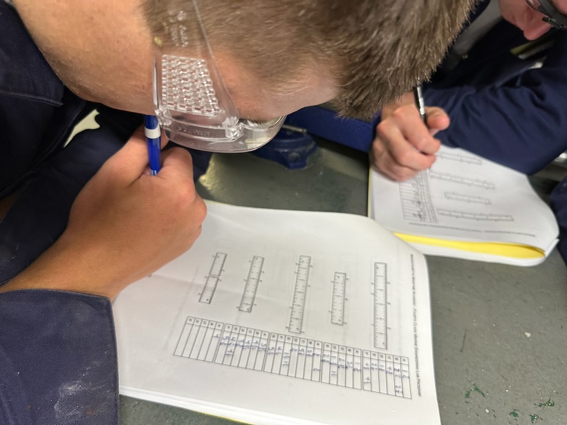 cadets in engine lab working with various tools