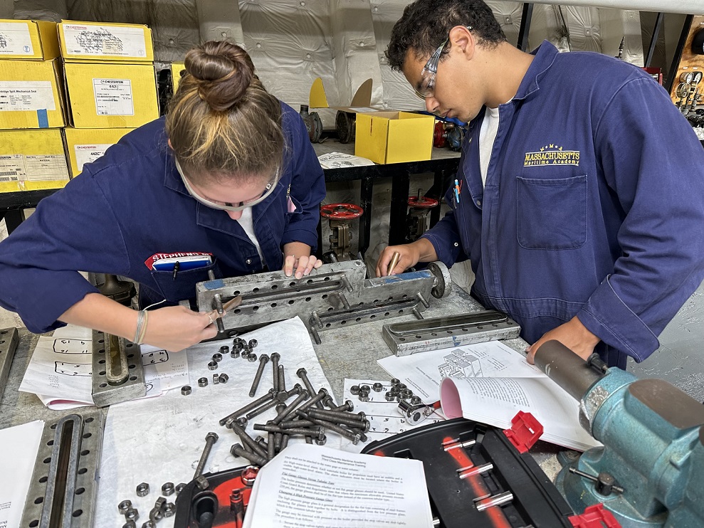 cadets in engine lab working with various tools