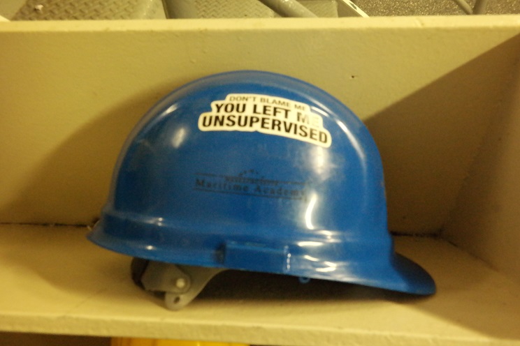 hat with unsupervised sticker