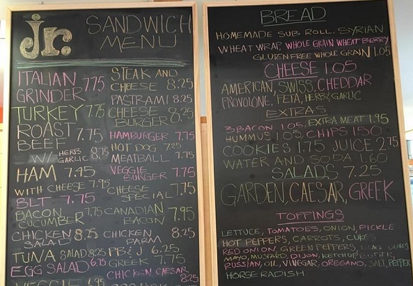 chalkboard menu with sandwiches