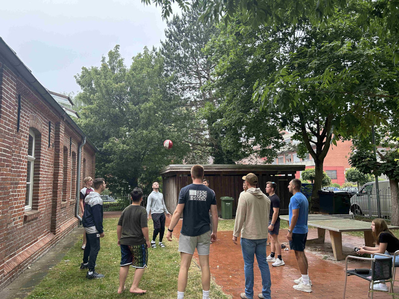 MMA student spending time with local students in Leers Germany