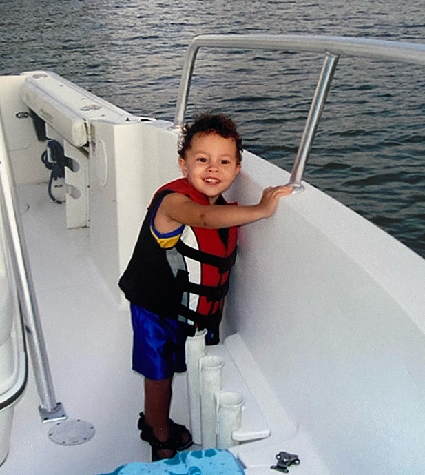 toddler Joey on a boat