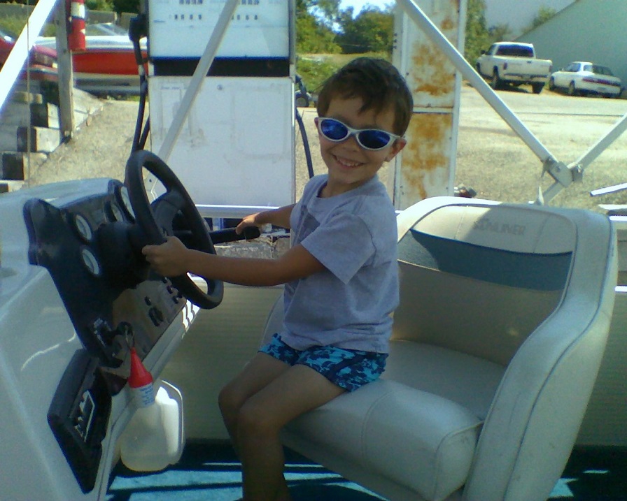 toddler Joey on a boat