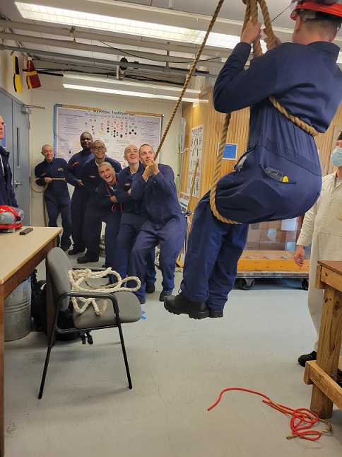 cadets lifting cadet with a rope