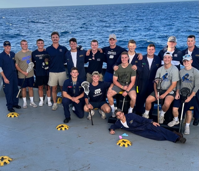 lacross team photo on deck