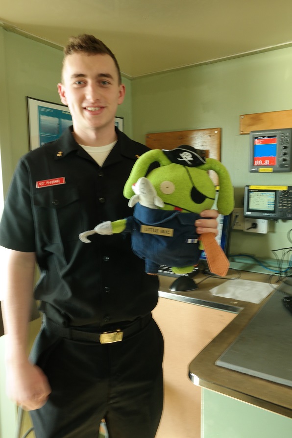 cadet holding little buc