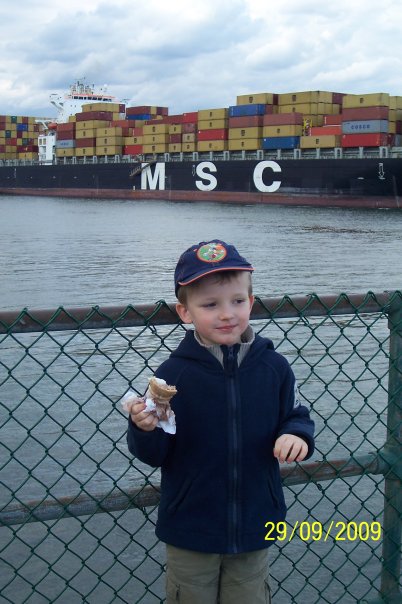 Michael in front of large container ship