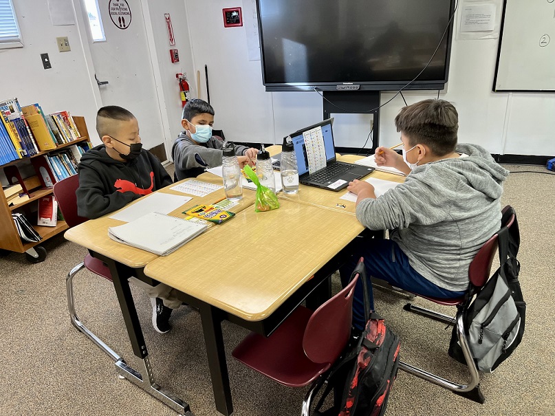 Navajo students working on signal flag messages