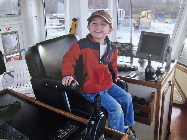 Nate on the bridge of a ship