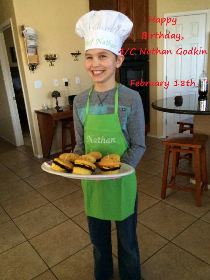 young boy in chef hat