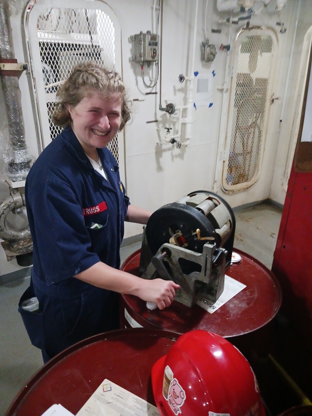 female cadets with a cylinder which is part of steering gear