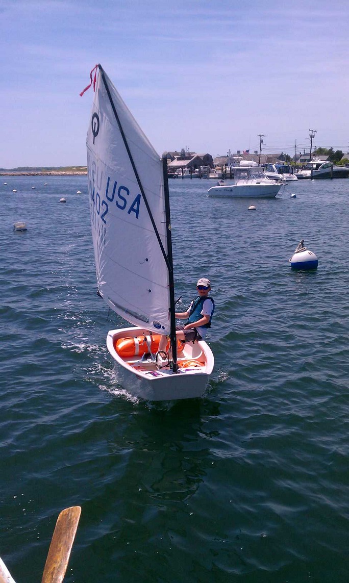 Nicholas in a boat