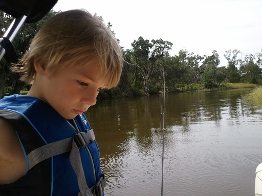 young Phin by a pond