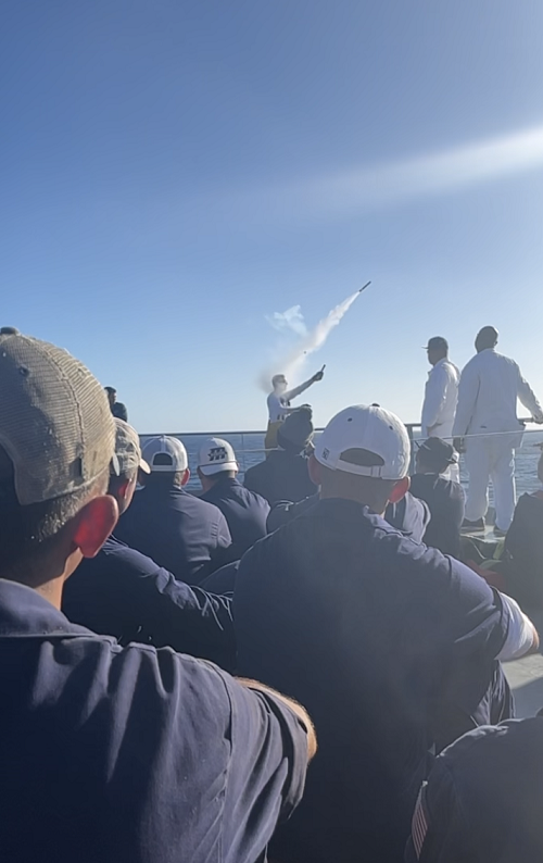 cadets on Helo deck watch pyrotechnics