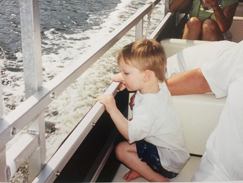 young Quinten on a boat