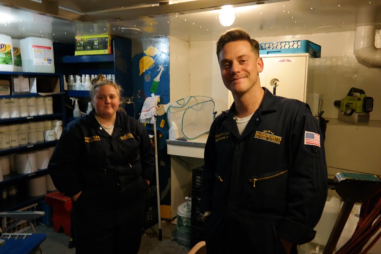 two cadets in supply closet