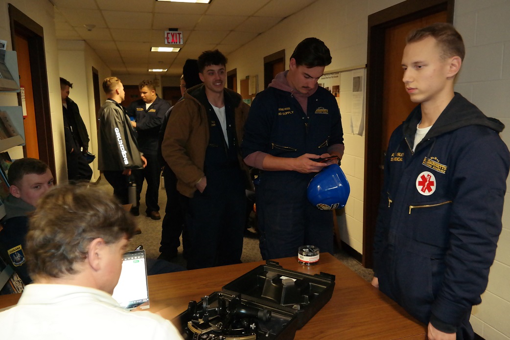 cadet picks up sextant