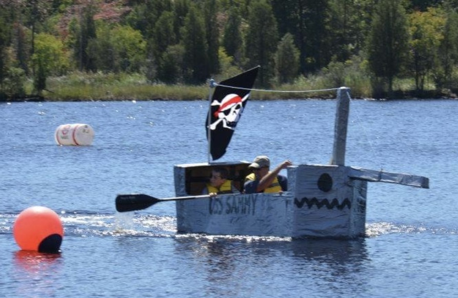 sam paddling his cardboard pirate ship