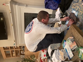 cadet packing in living room