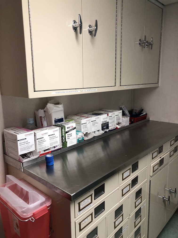 inside of sick bay on the ship - cabinet