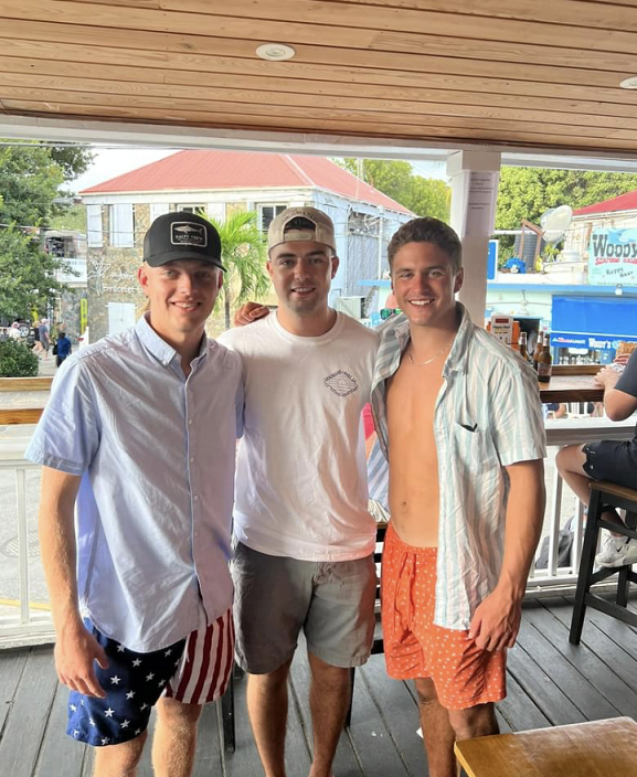 cadets pose at restaurant