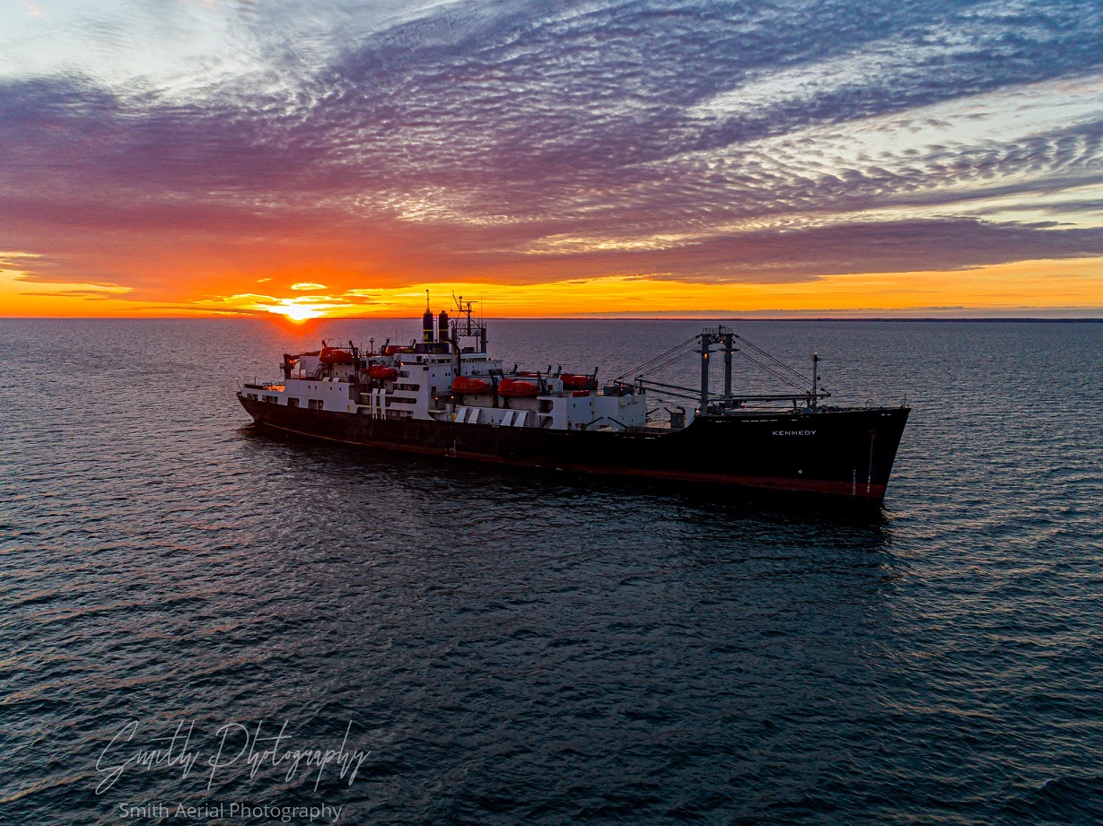 the ship at sea, sunset