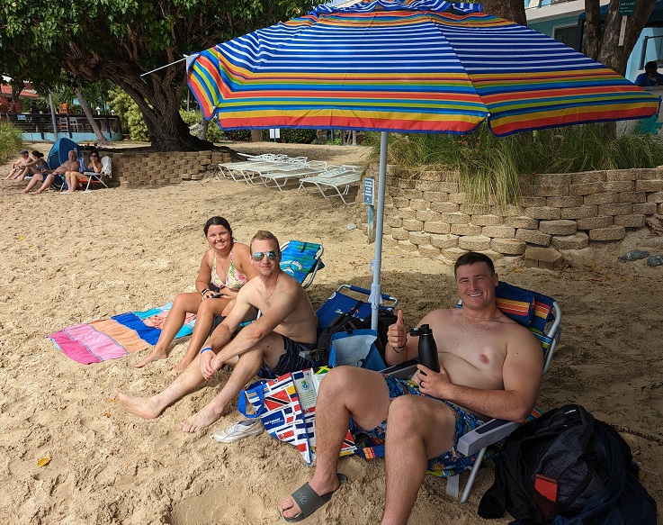 cadets pose on  beach