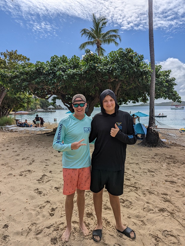 cadets pose on beach